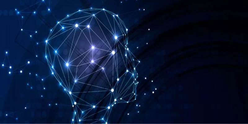 Wireframe illustration of a human head profile made of glowing network nodes