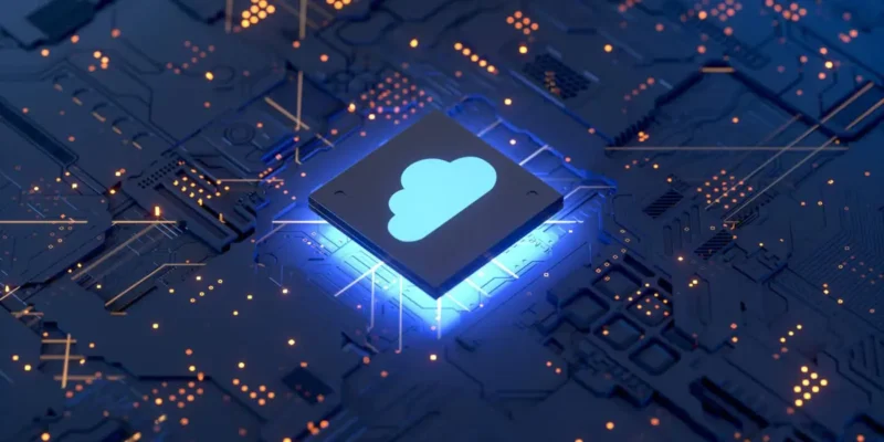 Glowing cloud icon on a circuit board chip representing cloud computing
